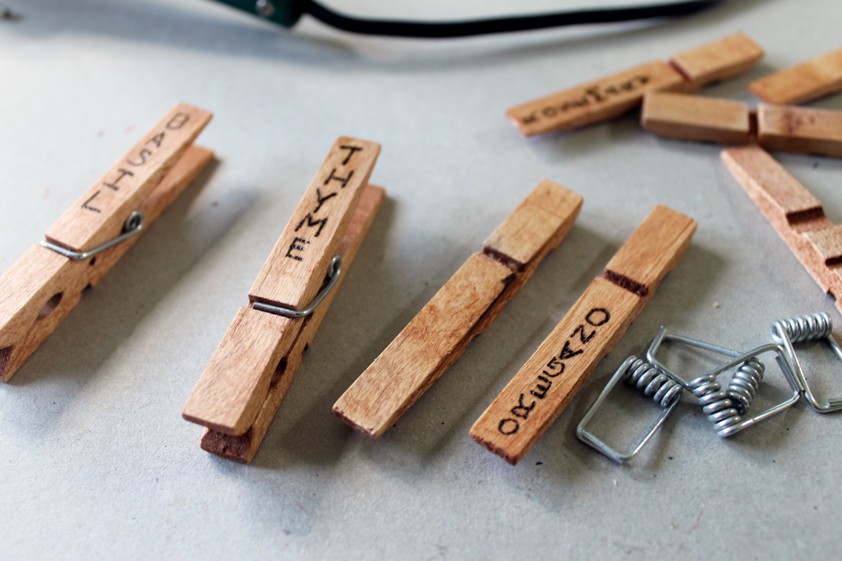 labeled stained wood clothespins